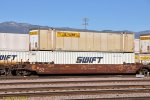 BNSF 211010-A with JB HUNT and SWIFT containers at San Bernardino CA.  10/31/2009